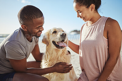 Buy stock photo Love, dog and couple being happy, smile or bonding on beach, vacation or outdoor together. Romance, black man and woman with golden retriever being loving, happiness or relax while walking or holiday