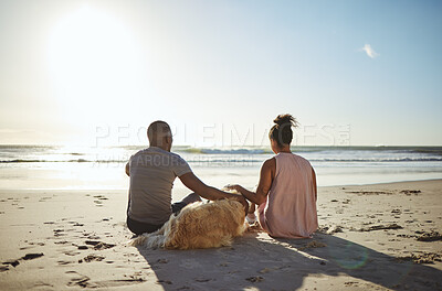 Buy stock photo Relax, dog and happy with couple at beach for peace, summer and sunset vacation. Love, support and travel with man and woman with pet by ocean for nature, health and date or holiday together 