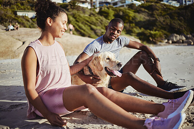 Buy stock photo Relax, fitness and dog with black couple at beach after training for workout, health or exercise. Nature, peace and wellness with man and woman enjoy sunset with pet in sand for energy, happy or time