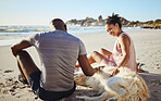 Fitness couple relax with dog at beach, sand and ocean after summer workout, free time and fun in sunshine together. Happy man, woman and people, labrador animal pets and freedom at calm sea outdoors