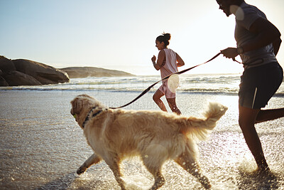 Buy stock photo Dog, black couple and running beach fitness with an animal for morning exercise and runner workout. Training, sport and sea run of people by waves and sand in summer with a golden retriever pet