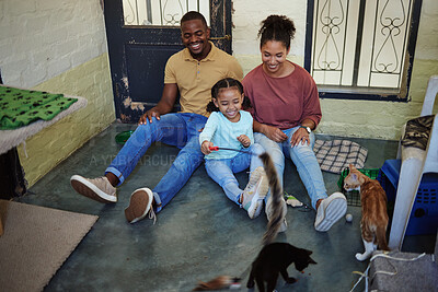 Buy stock photo Family, cats and fun and home with animals, pets and cat together with happiness and bonding. Happy mother, girl and father with pets playing with love, care and smile in a house with happiness