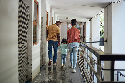 Buy stock photo Black family, children and animal shelter with a girl, mother and father walking together on a balcony. Kids, volunteer and charity with a man, woman and daughter holding hands at a rescue center