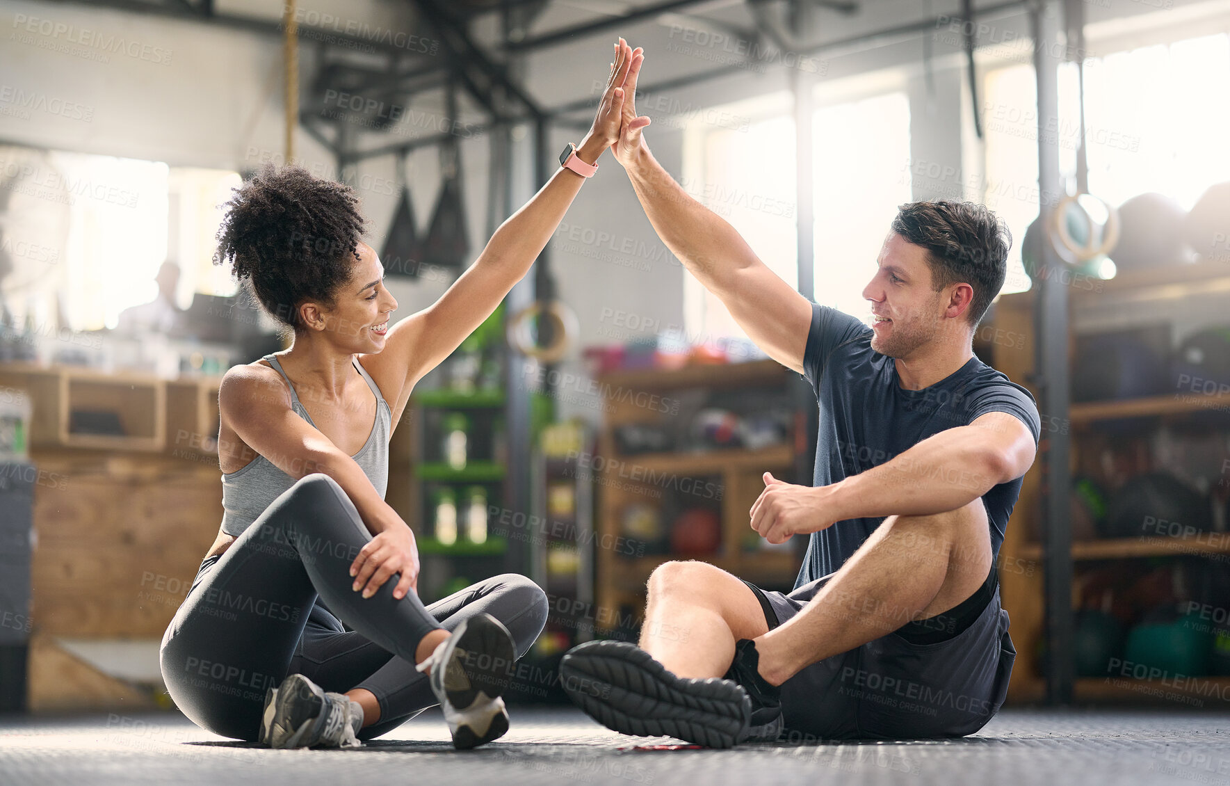 Buy stock photo High five, motivation and fitness with a man and woman celebrating as a winner pair together in a gym. Team, success and exercise with a male and female athlete training in partnership for health 