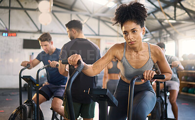 Buy stock photo Fitness, class and bike workout of a black woman in a cycling, training and exercise studio. Bicycle sport, gym wellness and sports health club with a person on a machine with athlete motivation 