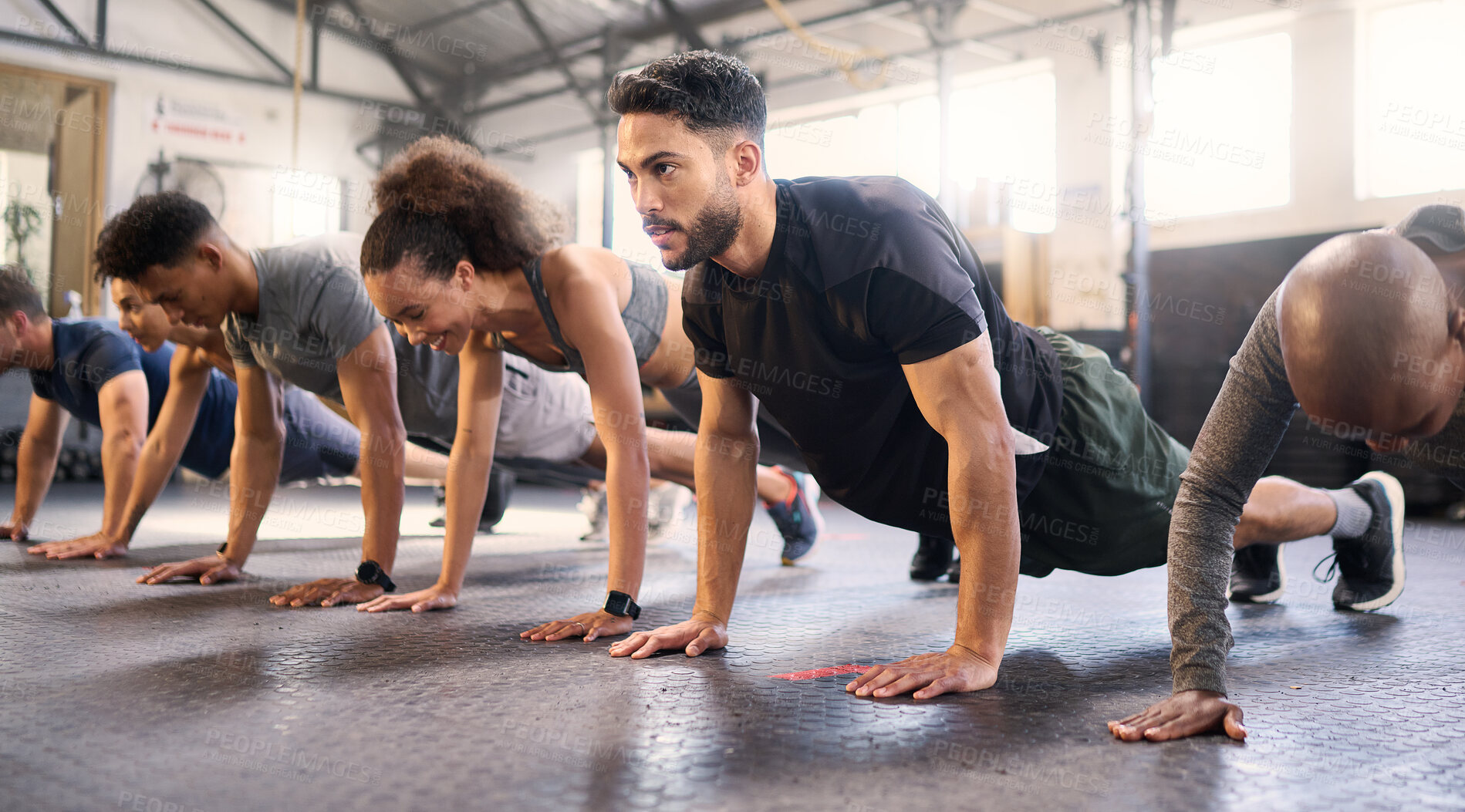 Buy stock photo Fitness, gym with men and women doing plank, strong and exercise for muscle, cardio and endurance in workout class. Health, wellness and diversity, body training and healthy active challenge.