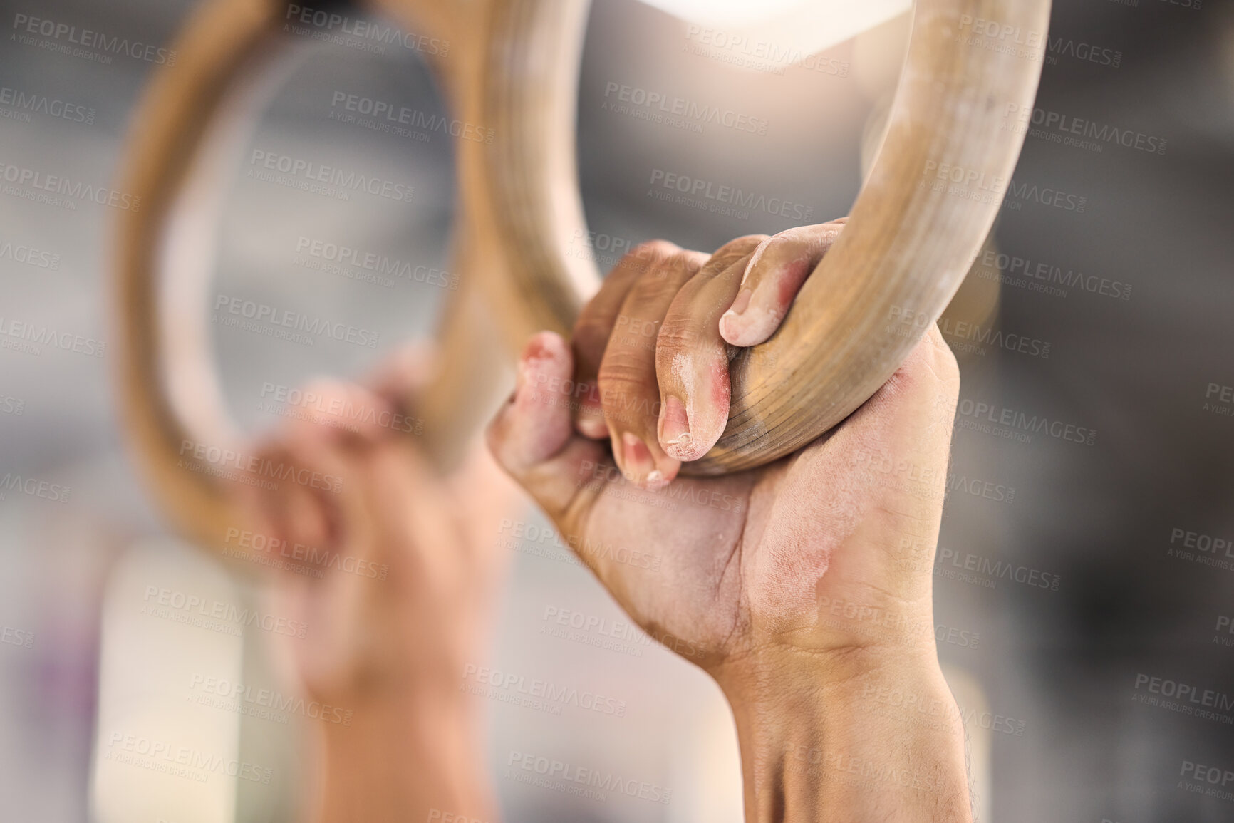 Buy stock photo Gym, hands and rings workout by man for fitness, muscle and training closeup with mockup. Hand, exercise and gym ring pull up by athlete guy cross, energy and endurance challenge, performance and fit