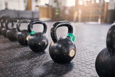 Fitness, crossfit or zoom of kettlebell in gym or New york studio for weightlifting exercise, muscle development or wellness workout. Metal, steel or heavy iron for health, training or sports goal