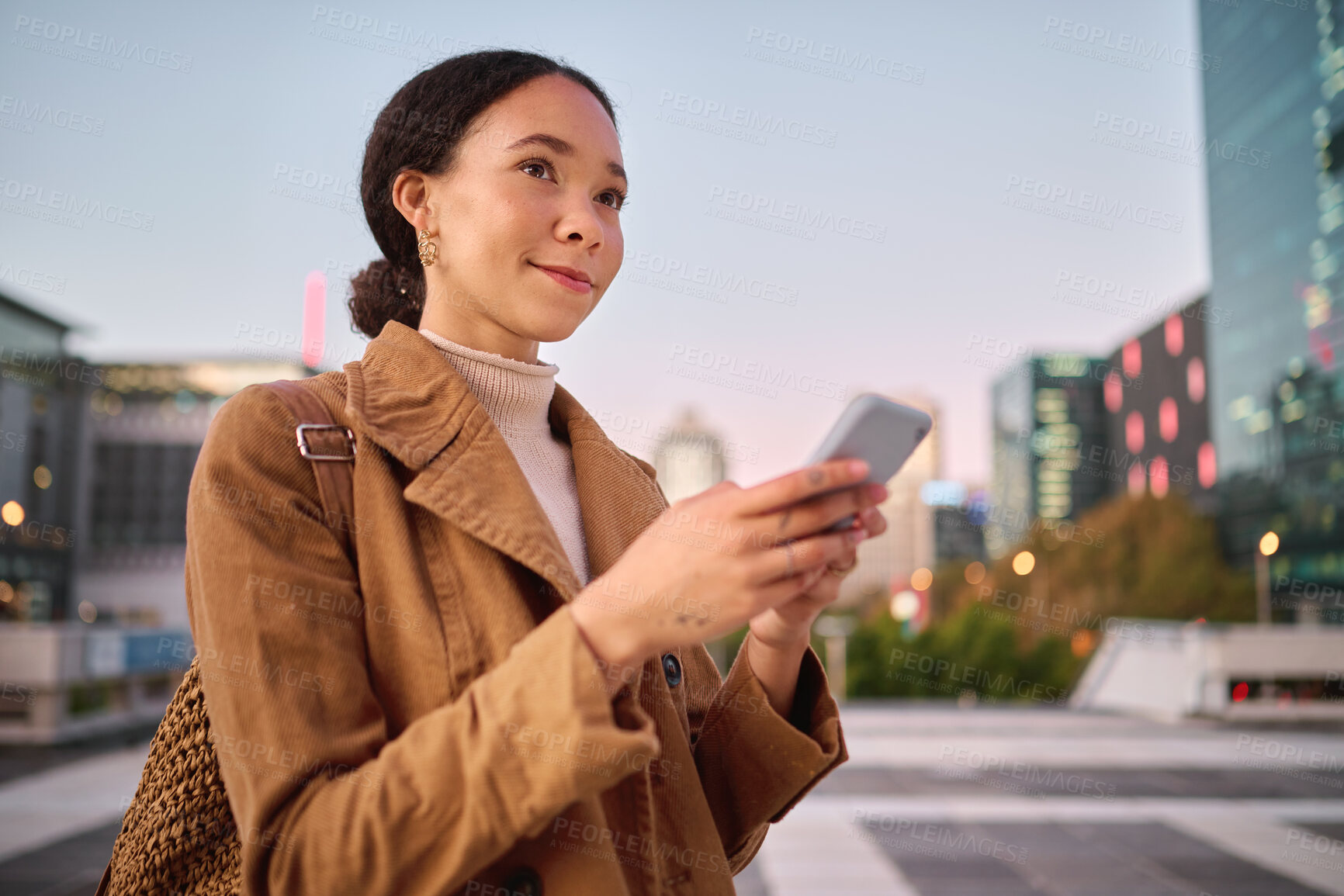 Buy stock photo Phone, social media and city with a business black woman walking on a street or road on her evening commute. 5g mobile technology, communication and networking with a female employee in an urban town