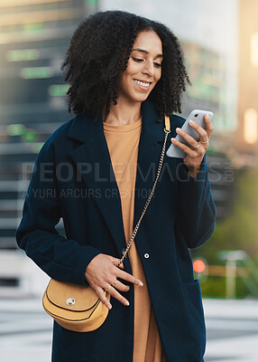 Buy stock photo Black woman, smile and phone in city on social media, reading email or typing on online app. Woman, happy and smartphone for social network, communication or contact on internet, web or mobile tech