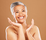 Skincare, beauty and portrait of senior black woman with smile on orange background in studio. Wellness, happiness and old female model for anti aging beauty products, skincare products and cosmetics
