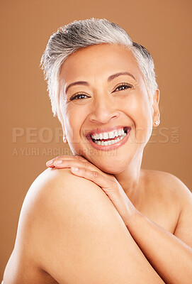 Buy stock photo Skincare portrait, senior woman with happy smile and natural beauty cosmetics for luxury wellness. Face of indian lady, dermatology in makeup on brown studio background and healthy body positivity