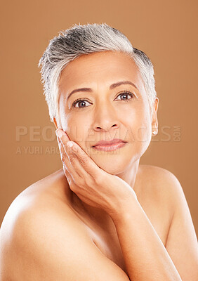 Buy stock photo Skincare, wellness and portrait of senior black woman isolated in studio on orange background. Beauty, cosmetics and old female pose for anti aging beauty products, skincare products and body care