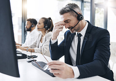 Buy stock photo Call center, customer service and man with headache, stress and tired of working in office. Burnout, crm and frustrated male telemarketing consultant in customer support on call with difficult client