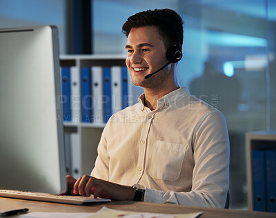 Buy stock photo Customer support service employee, smile at night and working on helping client with faq solution in digital call center. Telemarketing business, crm consultant at office desk and online consultant