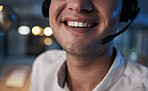 Call center, smile and mouth of a worker in telemarketing, support and crm business in a dark office. Ecommerce, contact us and happy customer service agent with a headset during night shift
