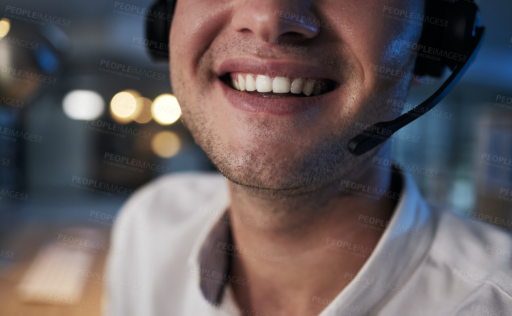 Buy stock photo Call center, smile and mouth of a worker in telemarketing, support and crm business in a dark office. Ecommerce, contact us and happy customer service agent with a headset during night shift