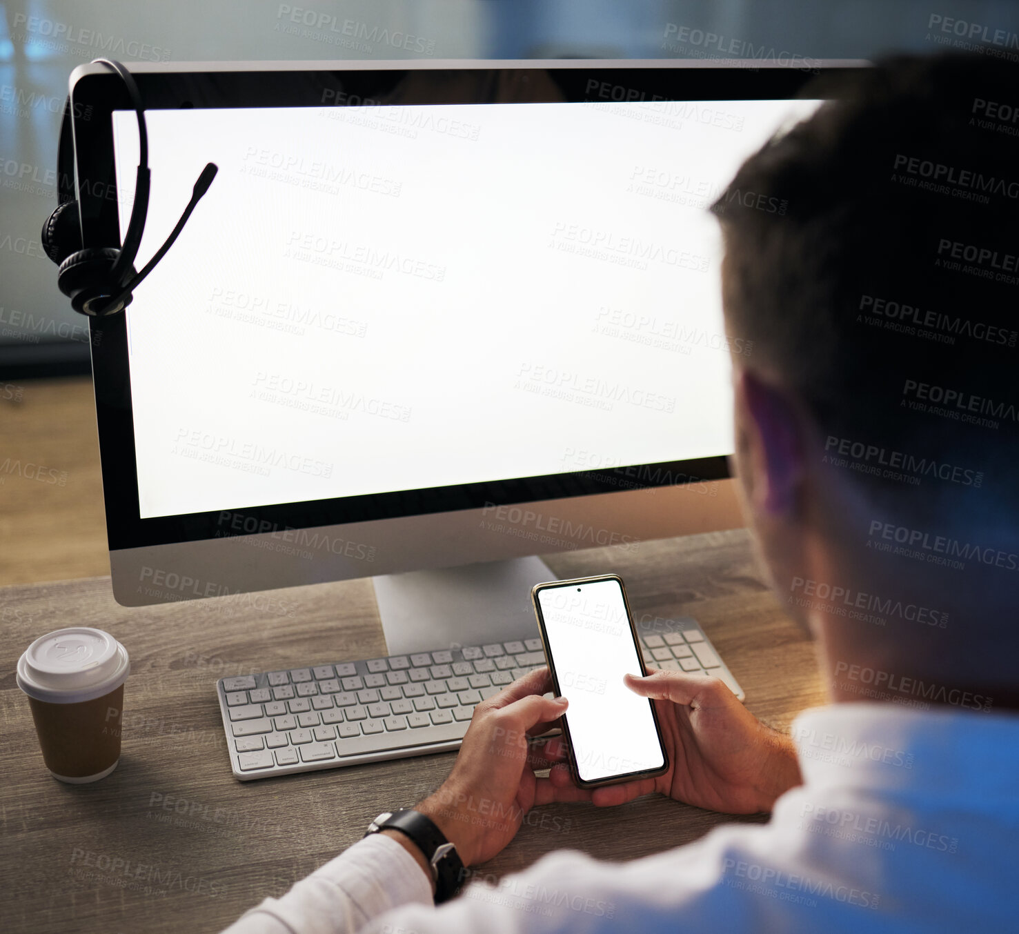 Buy stock photo Mockup, working and man with phone and computer at desk, online in call center office. Telemarketing, crm and businessman with blank screen on smartphone and pc for advertising, design and marketing