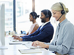 Call center, woman and typing on computer with group in office for online customer support, help or crm. Contact us, telemarketing and pc for customer service, consulting and email consulting on web