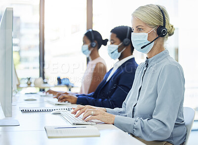 Buy stock photo Covid, call center and customer service with a business woman a work in a sales or telemarketing office. Corona, crm and contact us with a female consultant in a mask working in support or retail