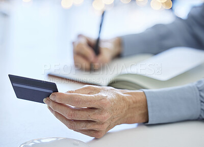 Buy stock photo Credit card, accountant woman and hands writing bank information in notebook for payment details in an office for finance management. Business woman or bookkeeping while making note for banking