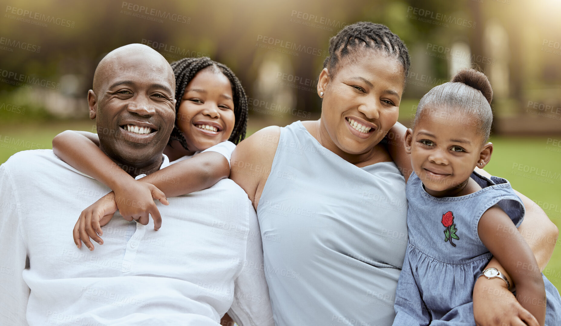Buy stock photo Happy black family, kids and portrait in park with love, pride or bonding together outdoor in summer. Happy family, black woman and man with children on grass for happiness, relax and vacation in sun