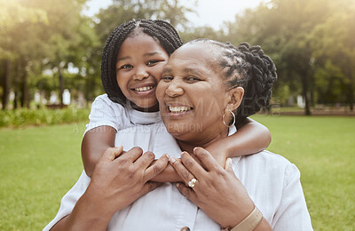 Buy stock photo Portait, children and piggyback with a mother and daughter in a park together on a sunny summer day. Happy, face and family with a black woman and girl child bonding outdoor in nature during the day