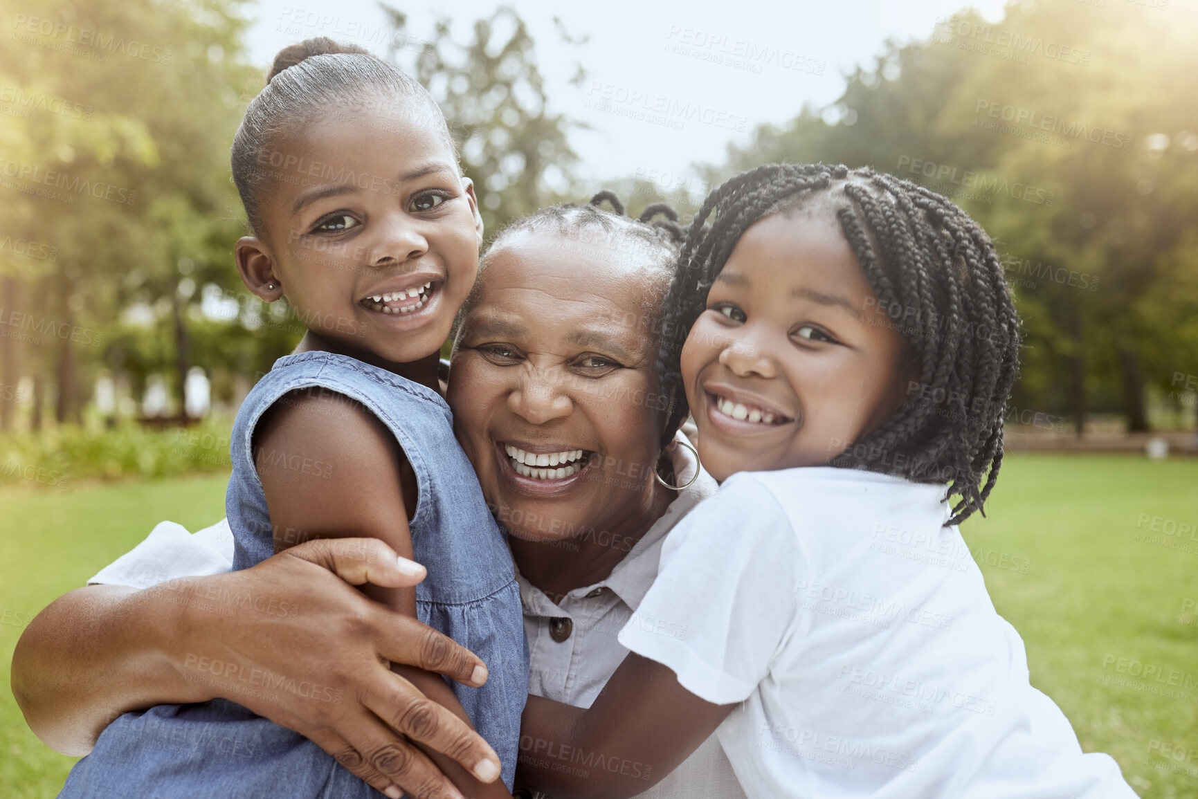 Buy stock photo Park, black family and portrait of children with grandmother bonding, smiling and having fun. Summer, love and grandma embrace and hug girls for quality time on weekend, holiday and vacation outdoors