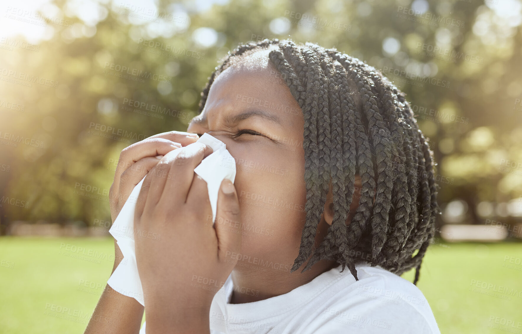 Buy stock photo Covid, health and black kid blowing nose at park, nature or outdoors. Wellness, healthcare and sick girl child with tissue to wipe nose for virus, infection or cold, flu or covid 19, fever or allergy