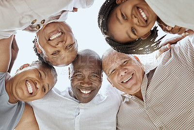 Buy stock photo Diversity, family and huddle together, smile and positive being loving, happy and embrace. Portrait, interracial and  happiness to connect, mixed race people and support for hug, bonding and love.