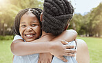 Family, children and hugging with a mother and daughter in a nature park or garden while spending time together. Summer, portrait and love with a girl and black woman embracing while bonding outdoor