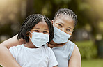 Black mother, girl and covid face mask at park for health, safety and protection from virus infection. Family, love and covid 19 compliance, mom bonding and care with child outdoors in nature garden.