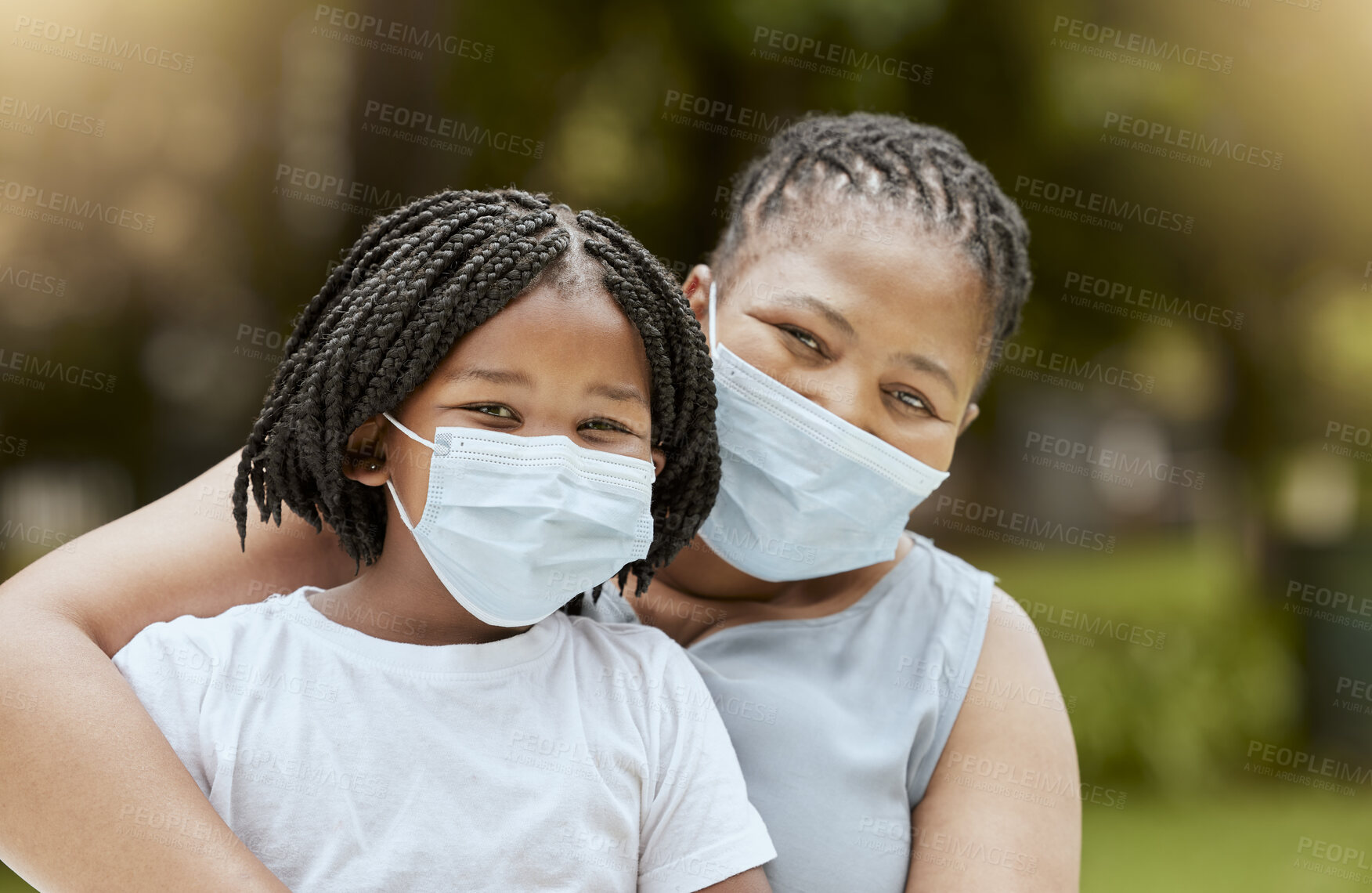 Buy stock photo Black mother, girl and covid face mask at park for health, safety and protection from virus infection. Family, love and covid 19 compliance, mom bonding and care with child outdoors in nature garden.