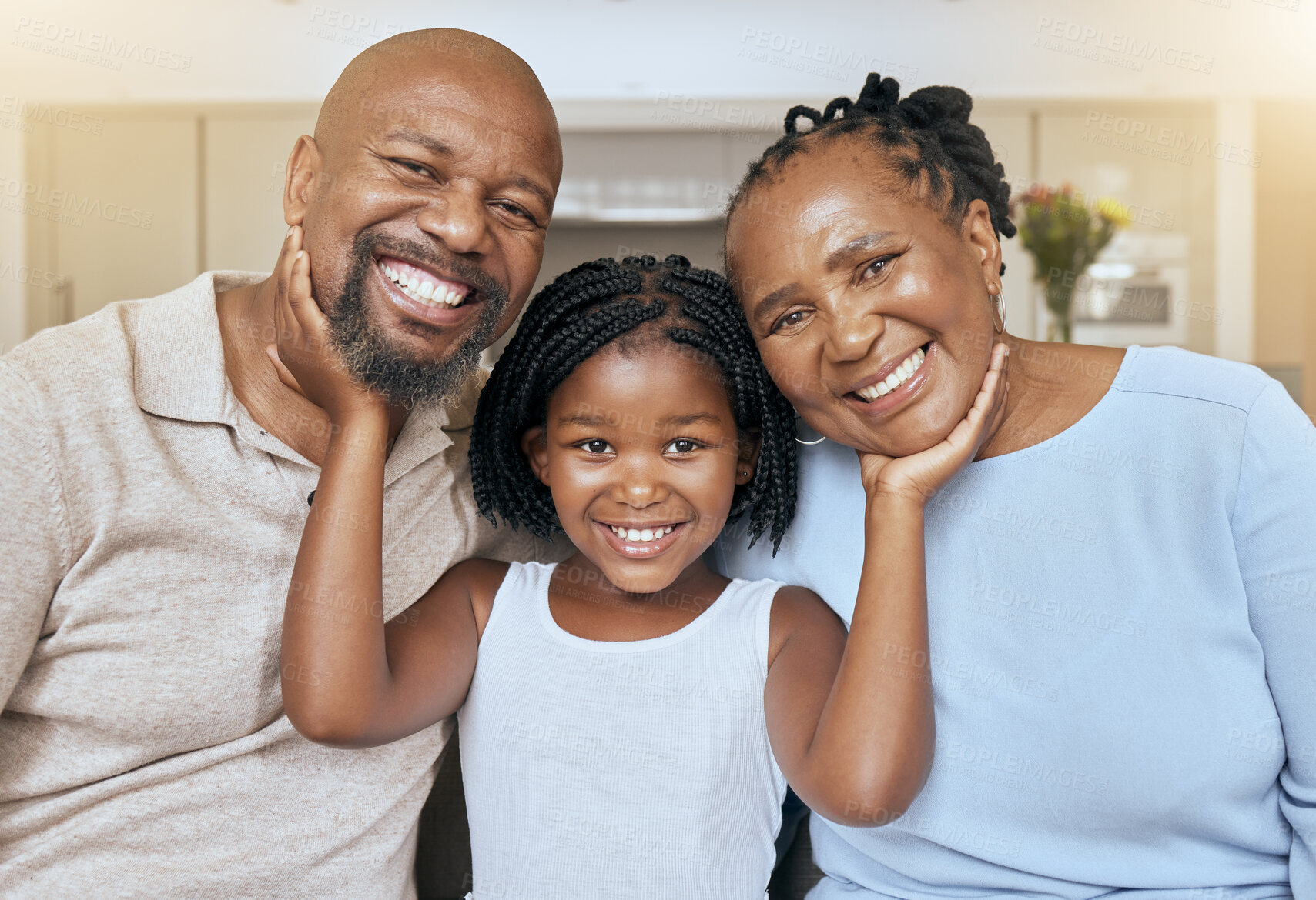 Buy stock photo Love, care and portrait of a child with grandparents in the living room of their family home. Support, smile and girl kid with affection for happy senior man and woman in their house with flare