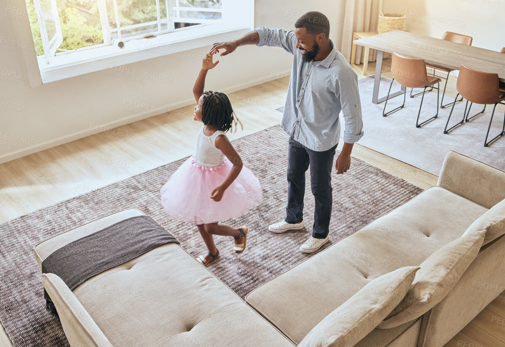 Buy stock photo Man, father or girl ballet dancing in living room of house or happy family home in energy, ballerina tutu or dress in top view. Dad, child or dancer kid bonding in creative comic fun in South Africa