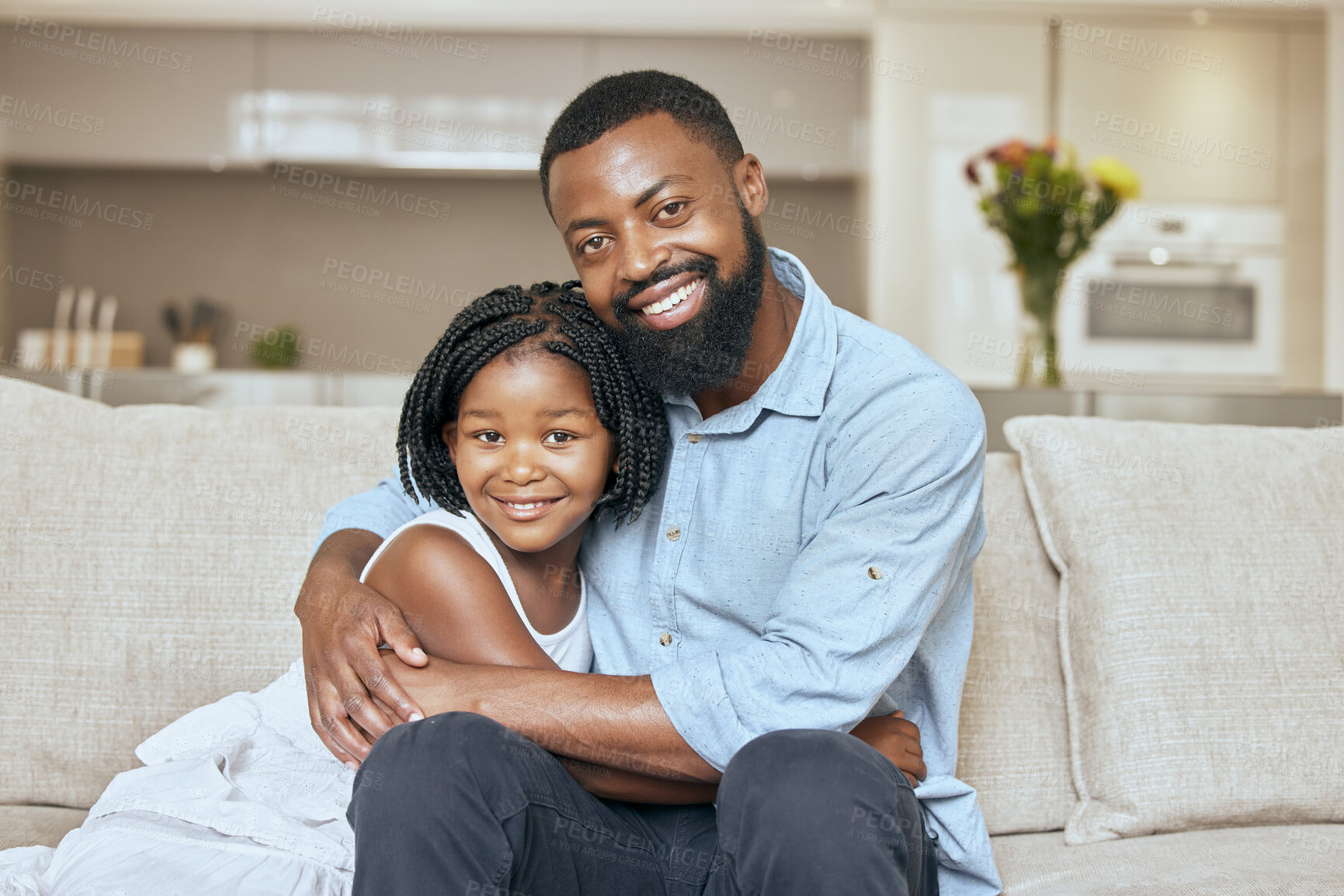 Buy stock photo Hug, happy and portrait of a girl with her father on the living room sofa to relax together in a house. Family, love and African dad hugging his child with care and a smile on the couch in their home