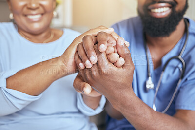 Buy stock photo Nurse, holding hands and patient support, kind and care with doctor giving black woman care for diagnosis or treatment. Console, trust and compassion with gp or nursing staff in healthcare hold hand