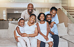 Happy black family, portrait smile and sofa relaxing together for quality bonding or break at home. Mother, father and grandparents with kids smiling in relax for family time on living room couch