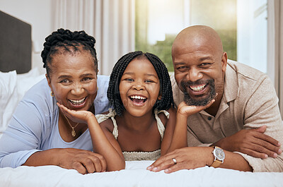 Buy stock photo Portrait of happy family home, girl and grandparents on bed for fun morning, relax lifestyle. Smile senior man, black woman and playful kid child face together in bedroom for love, care and joy