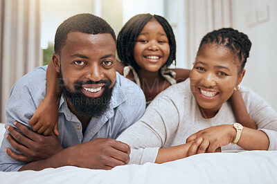 Buy stock photo Black family, portrait or bonding on bed in house, home bedroom or hotel in trust, love or security for mothers day or fathers day. Smile, hug and happy girl, child or daughter with mother and father