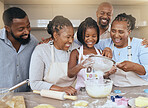 Big family, baking and learning while teaching girl to bake in kitchen counter, love and fun together in home. Black dad, mom and grandparents with kid with food, ingredients and flour for breakfast
