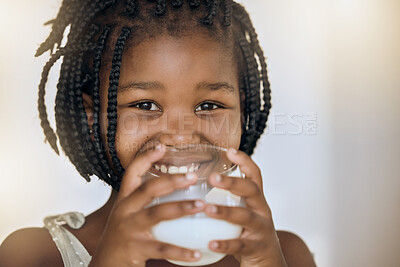 Buy stock photo Milk, health and nutrition portrait of black kid for wellness, calcium and diet with smile. Young, girl and happy child holding dairy drink in glass for a healthy lifestyle with mockup.

