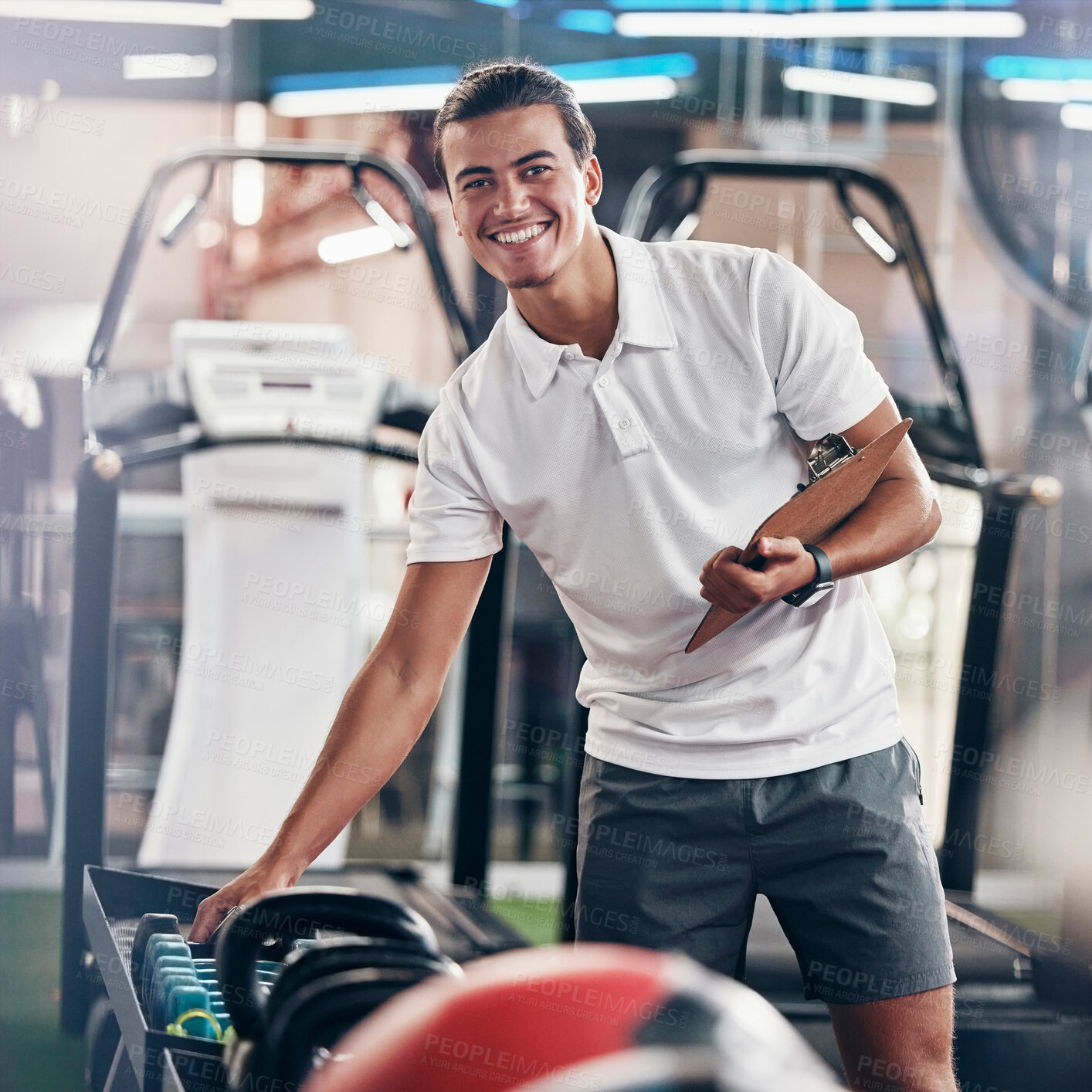 Buy stock photo Training, portrait and fitness coach doing inspection of equipment at the gym. Wellness, sport and happy trainer doing check, planning and working at a club for athlete health, sports and workout