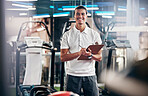 Gym, fitness and portrait of a personal trainer with a clipboard for a training consultation. Happy, smile and sports coach or athlete with a wellness, health and exercise checklist in workout center