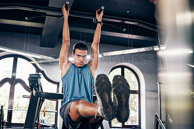 Fitness, pull ups workout and man in gym on bars training for health, wellness and strength. Energy, personal trainer and male body builder from Canada exercising for muscle power in fitness center.