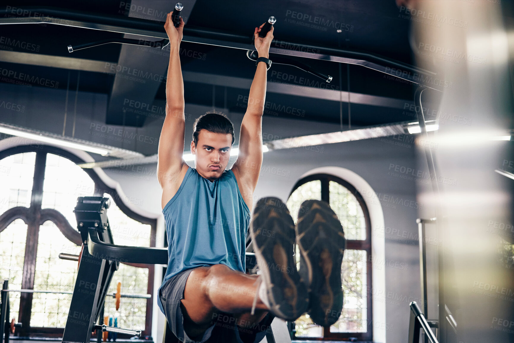 Buy stock photo Fitness, pull ups workout and man in gym on bars training for health, wellness and strength. Energy, personal trainer and male body builder from Canada exercising for muscle power in fitness center.