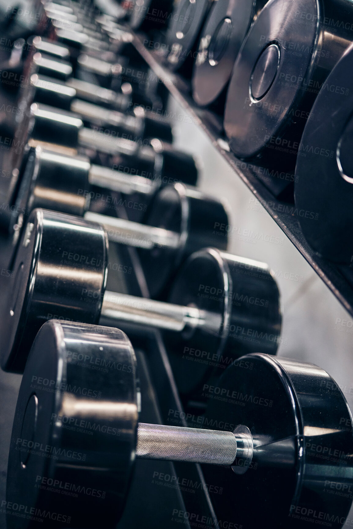 Buy stock photo Fitness, workout and dumbbells in an empty gym for exercise, body building development or strength training for wellness. Commitment, motivation or heavy metal weights for strong arms or body muscles