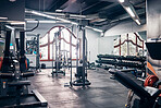 Empty gym, backgrounds and exercise building for sports, training and fitness, wellness and weightlifting. Health club interior space, recreation center and room with bodybuilding workout machines 