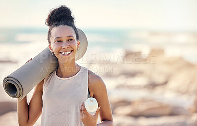 Buy stock photo Happy black woman, fitness and smile for yoga in preparation for training, exercise or workout at the beach. Female smiling in spiritual wellness holding sports mat for calm, zen and exercising day