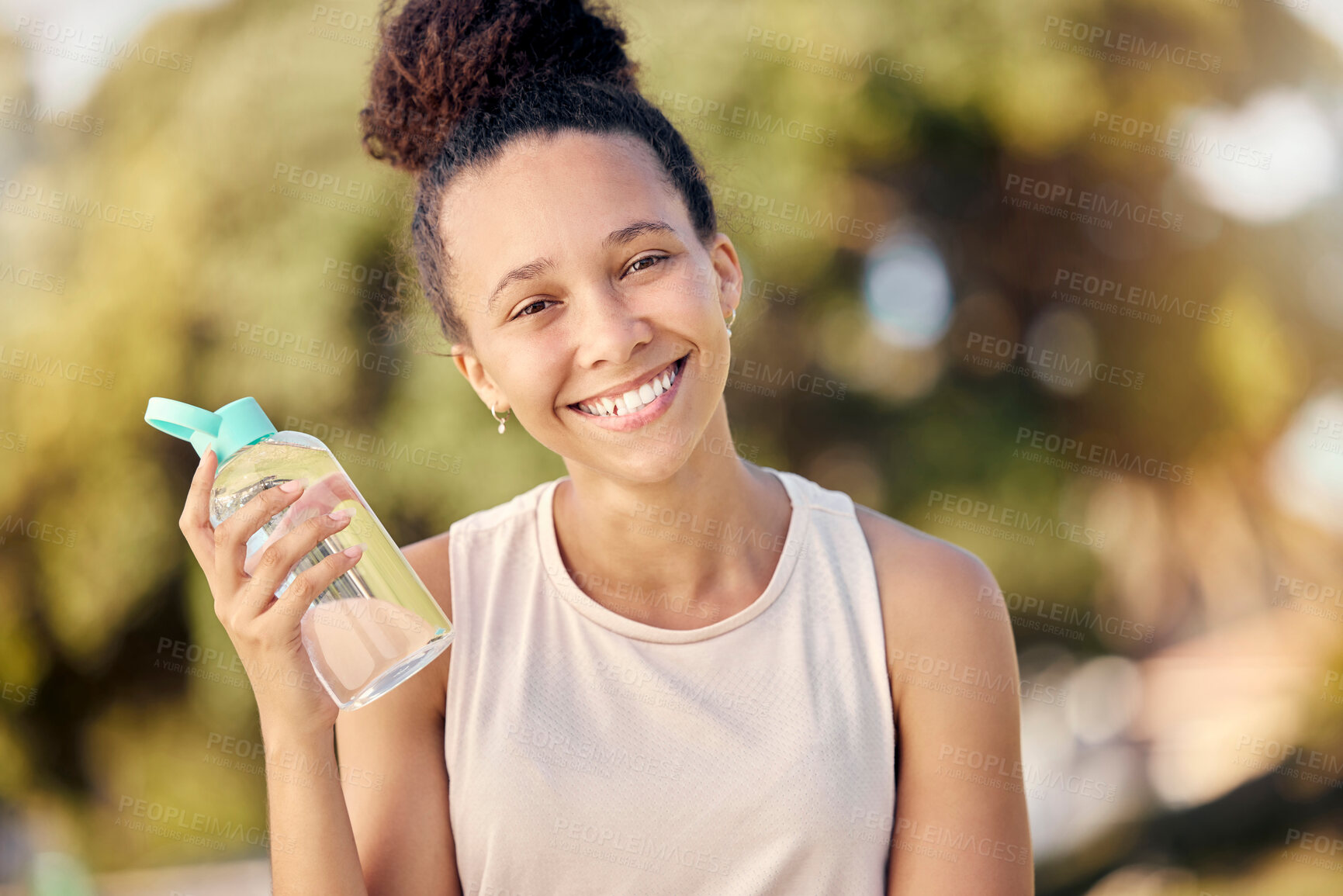 Buy stock photo Water bottle, fitness and nature of black woman in portrait for outdoor exercise, wellness and healthy diet lifestyle in park or forest. Trees bokeh, workout and sports girl with drinking water gear